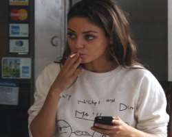 Mila Kunis smoking
